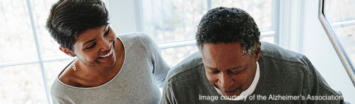 JPEG image showing section of a photograph of an African-American father and daughter courtesy of the Alzheimer's Association.